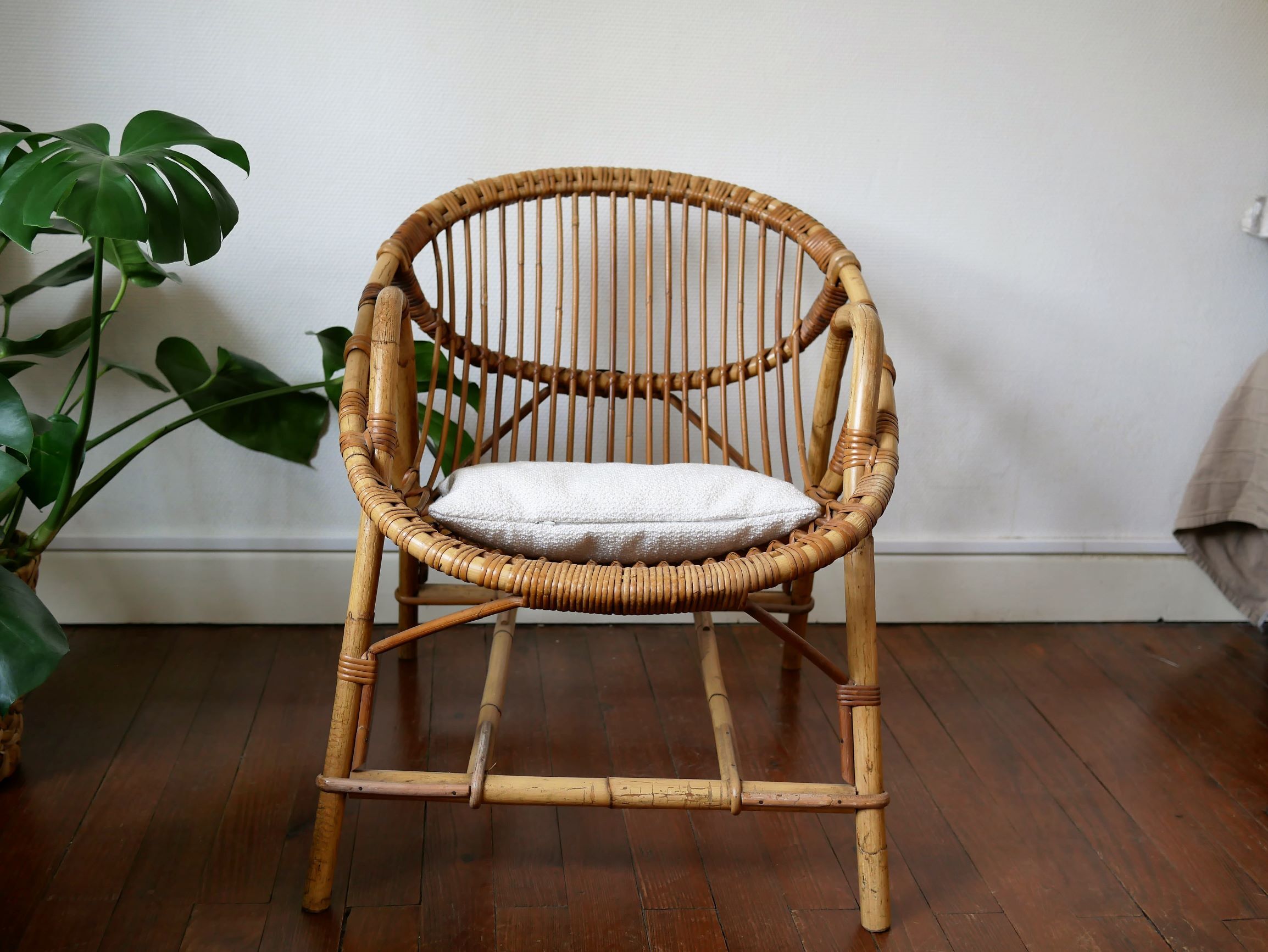 Vintage rattan "shell" armchair