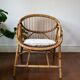Vintage rattan "shell" armchair