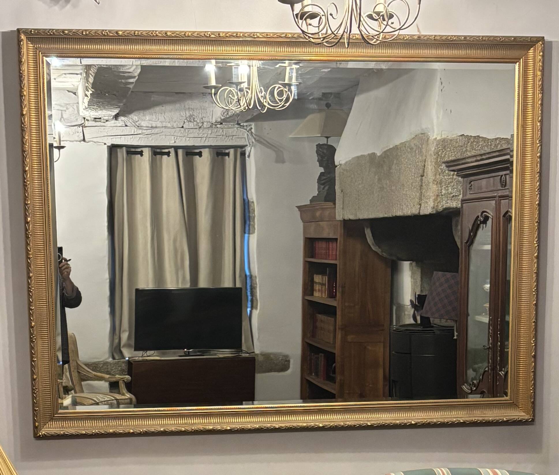 Large vintage gold rectangular mirror; highly sought after by decorators.