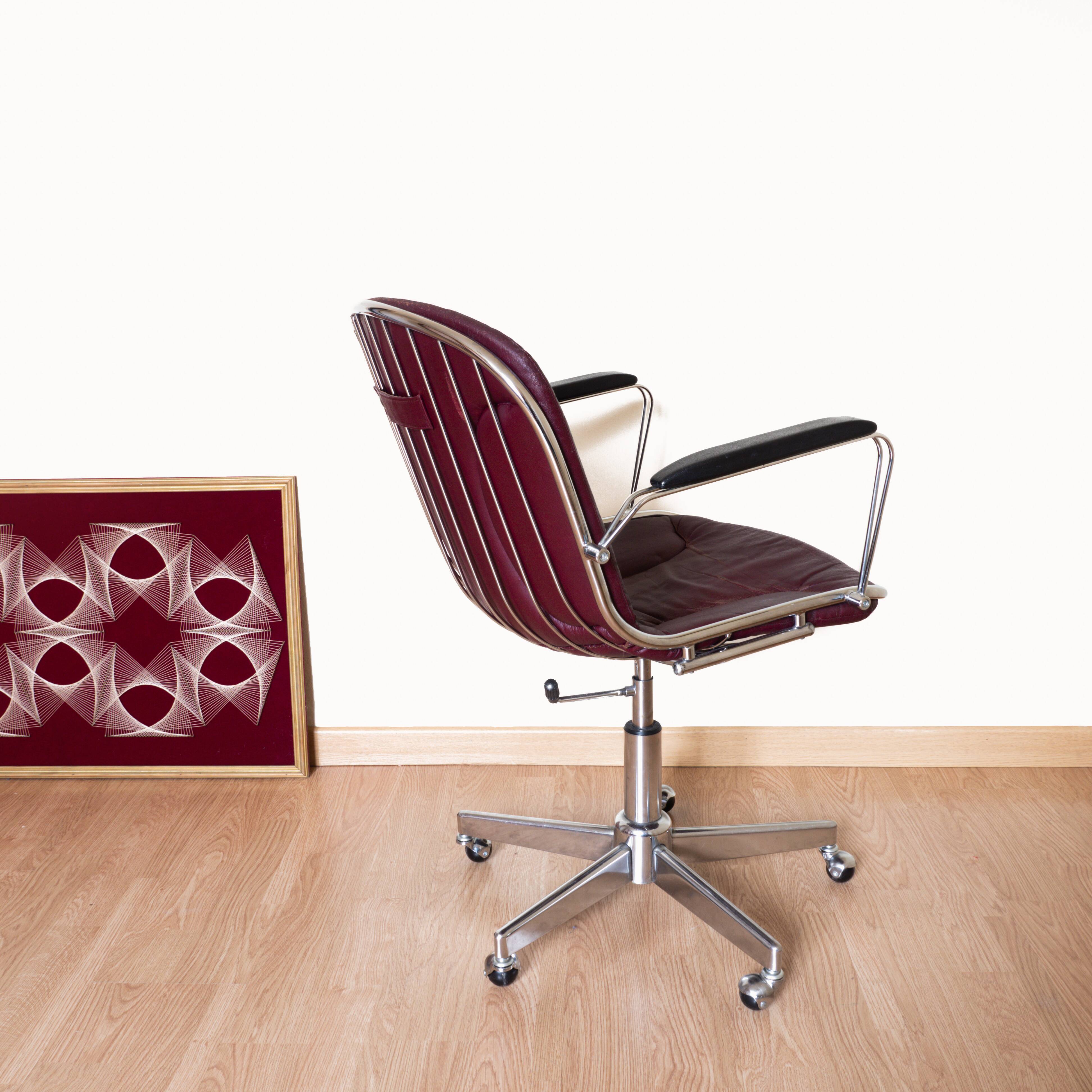 Dark red leather hairdresser's chair