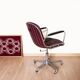 Dark red leather hairdresser's chair