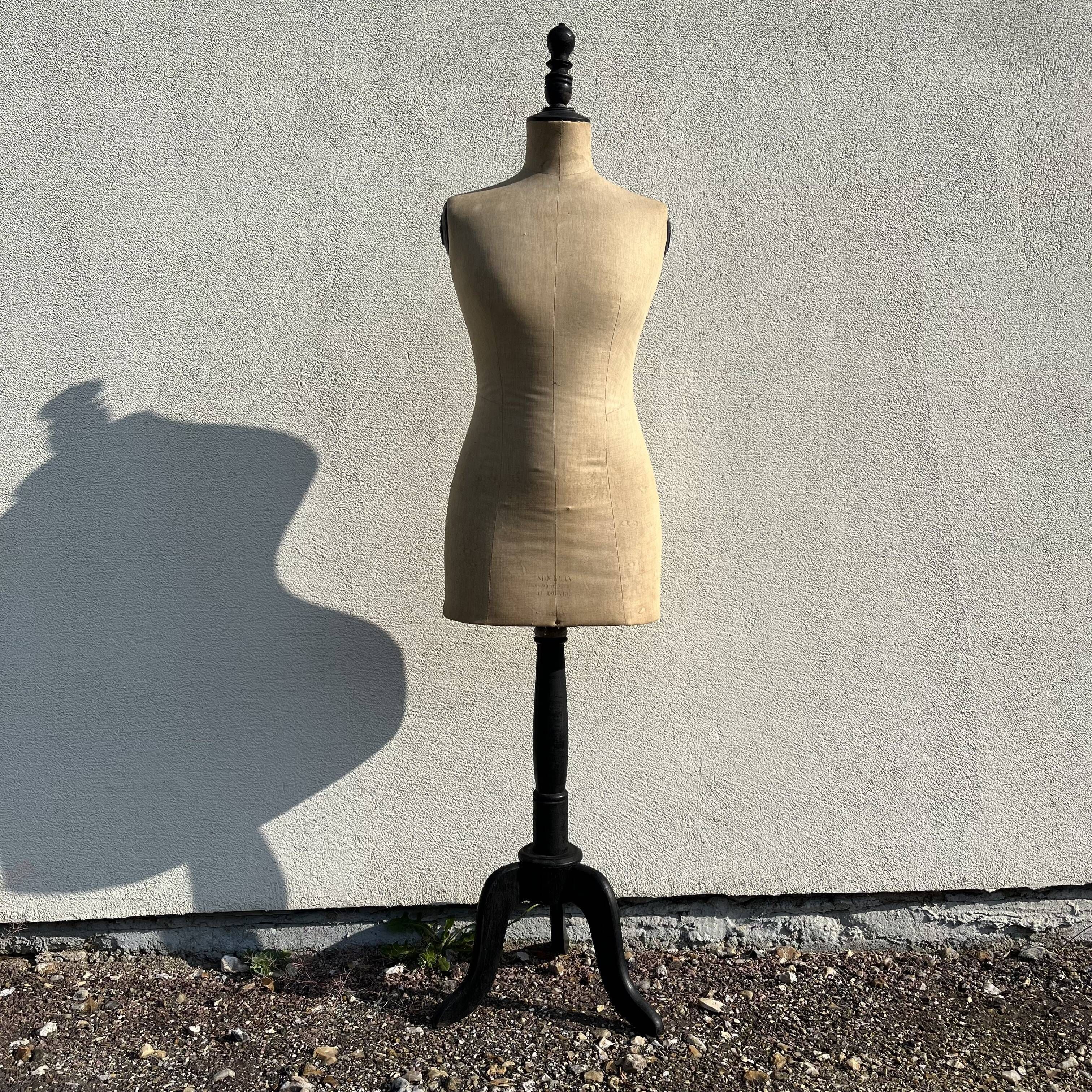 Antique mannequin in fabric and blackened wooden foot Stockman Paris Le Louvre