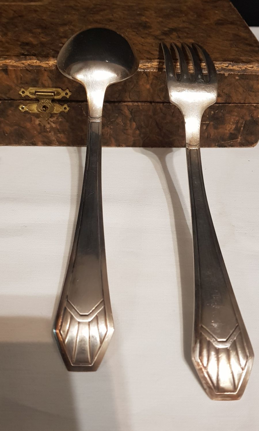 23-piece silver metal art deco cutlery set