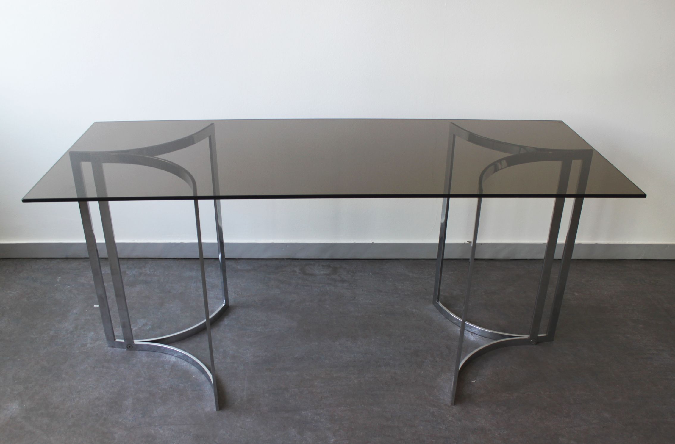 Smoked glass console with chrome legs, 1970.