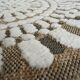 Round jute rug with white relief patterns, 90 cm