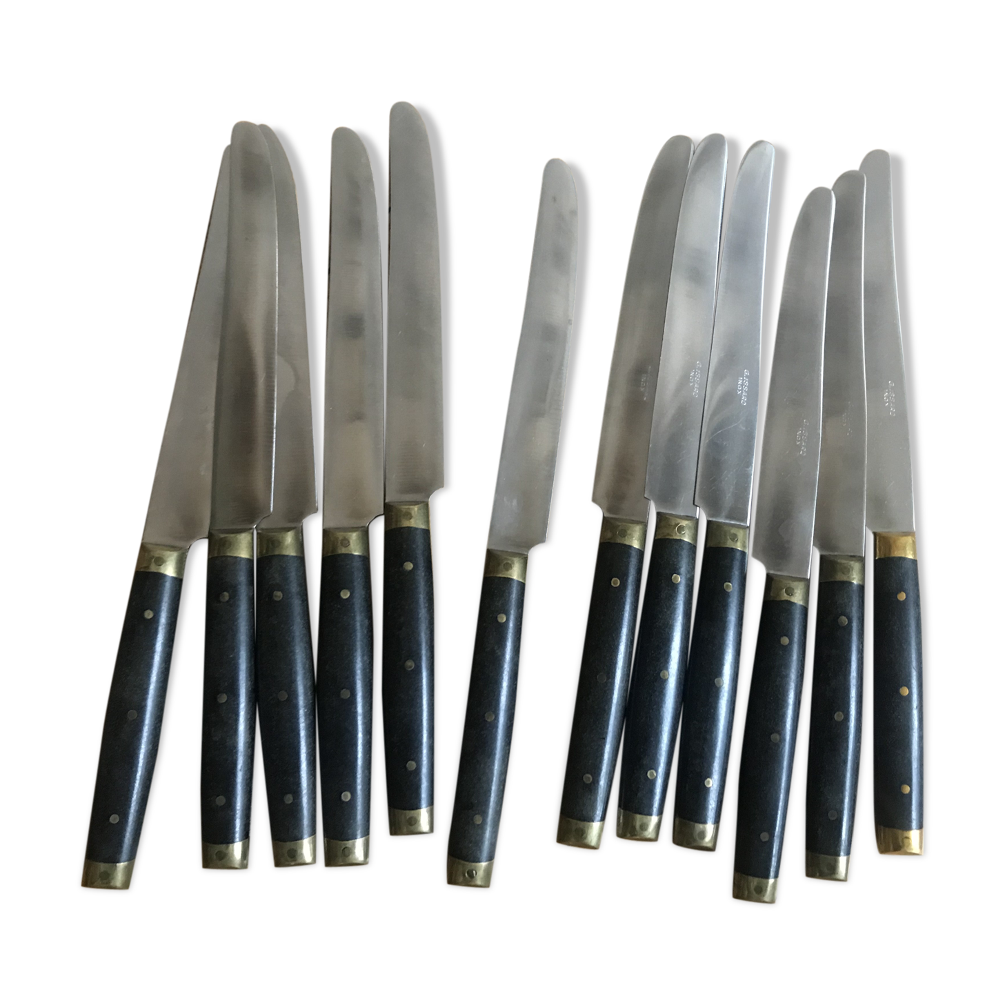 Twelve Ebony Bakelite Knives