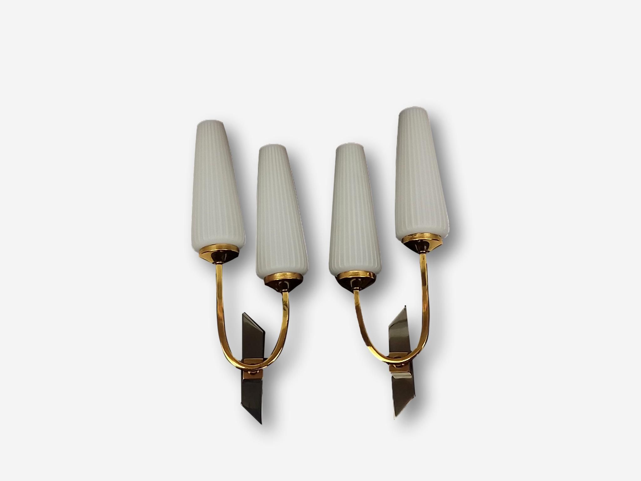 Pair of wall lamps in gilded metal and opaline style white glass