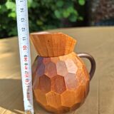 Small faceted wooden pitcher