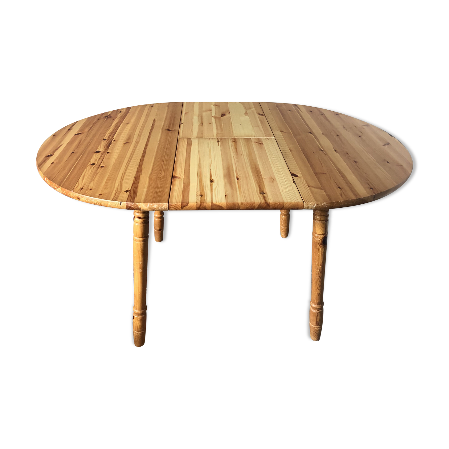 Round table in varnished pine with extension cord