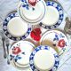 Old mismatched flat plates in earthenware