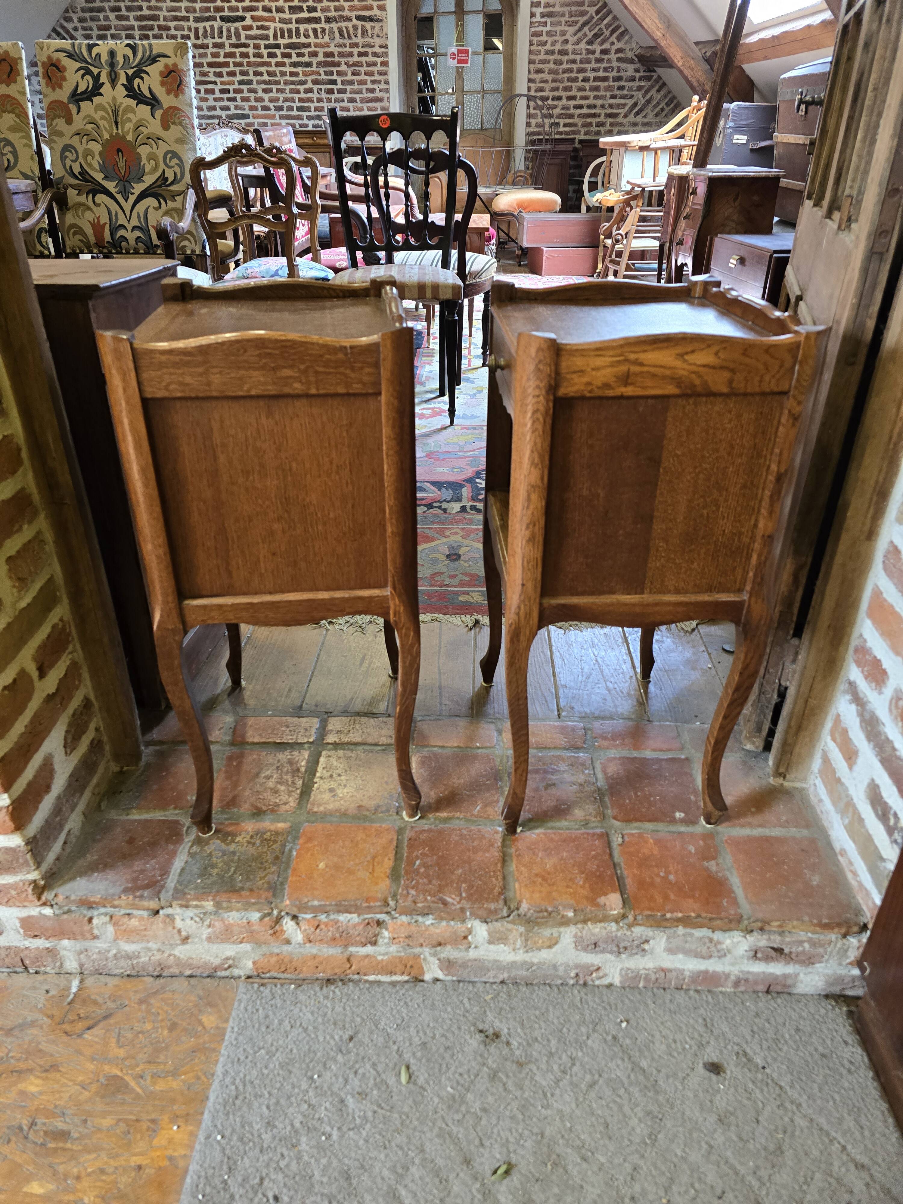Pair of Louis XV style oak bedside tables