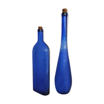 Paire de bouteilles en verre vintage