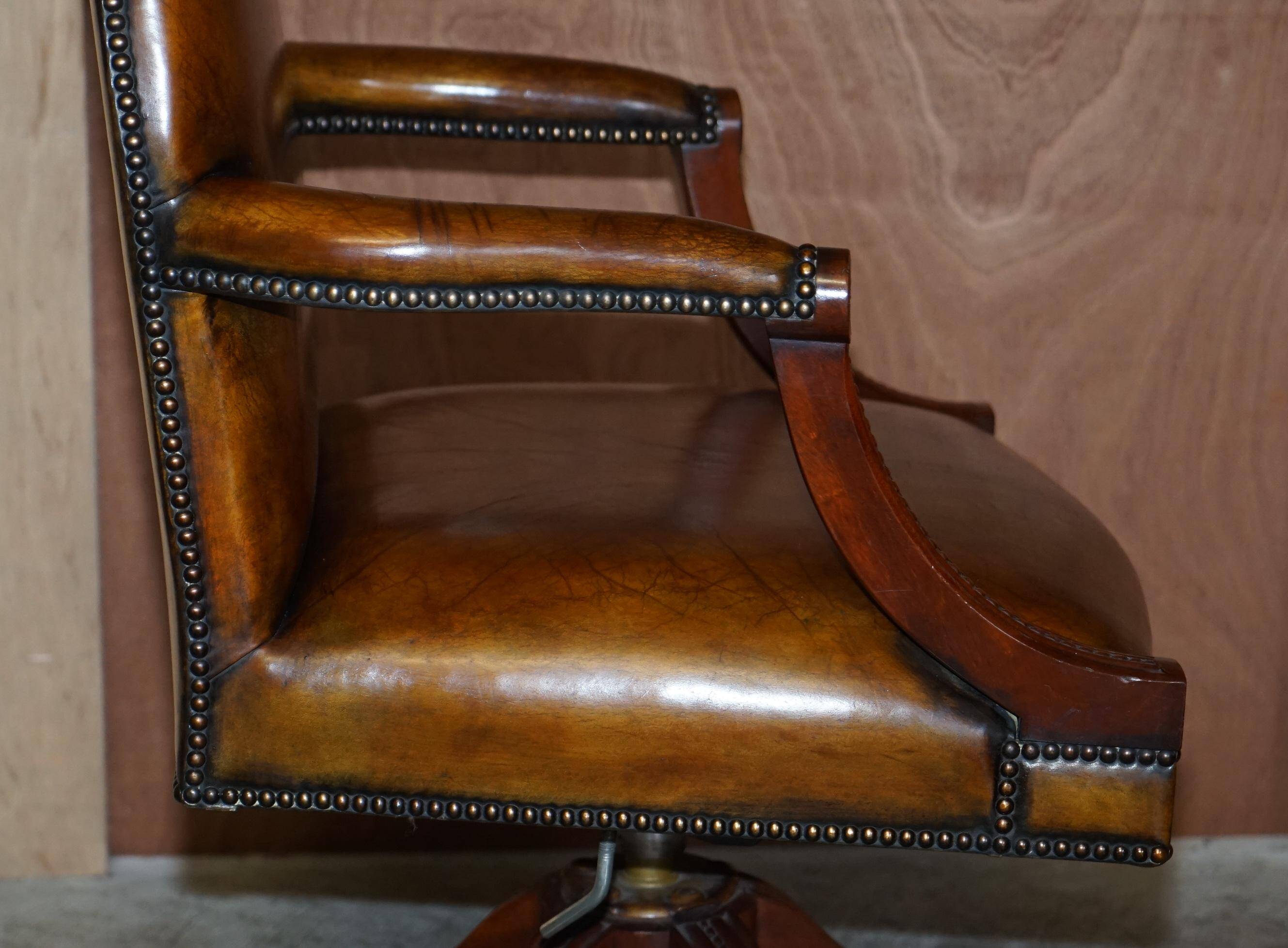 Restored vintage executive chair, leather, oak frame.