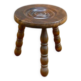 Turned wooden tripod milking stool