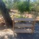 Rattan shelf with crossbars 60's