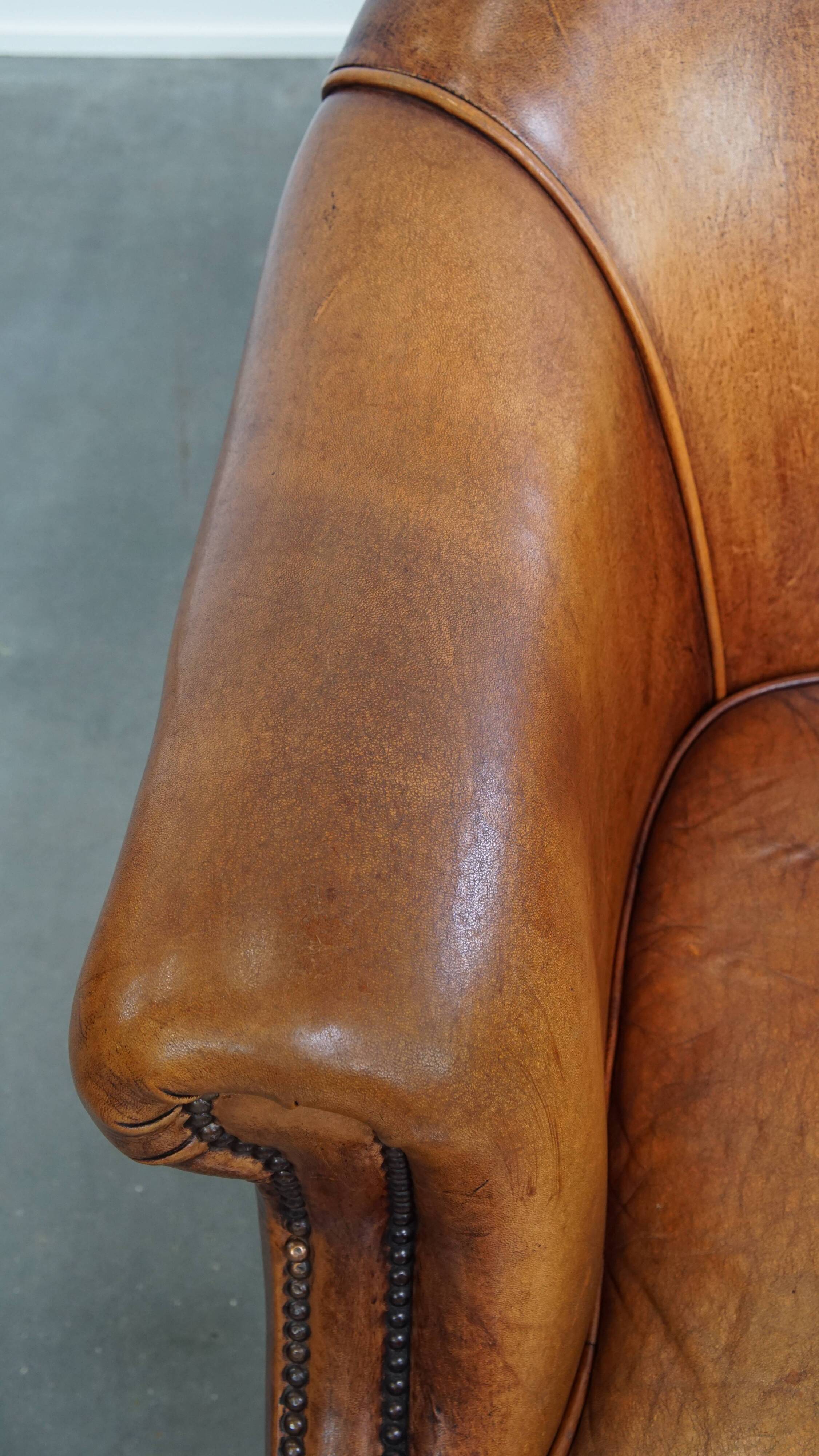 Set of 2 club chairs made of sheepskin leather