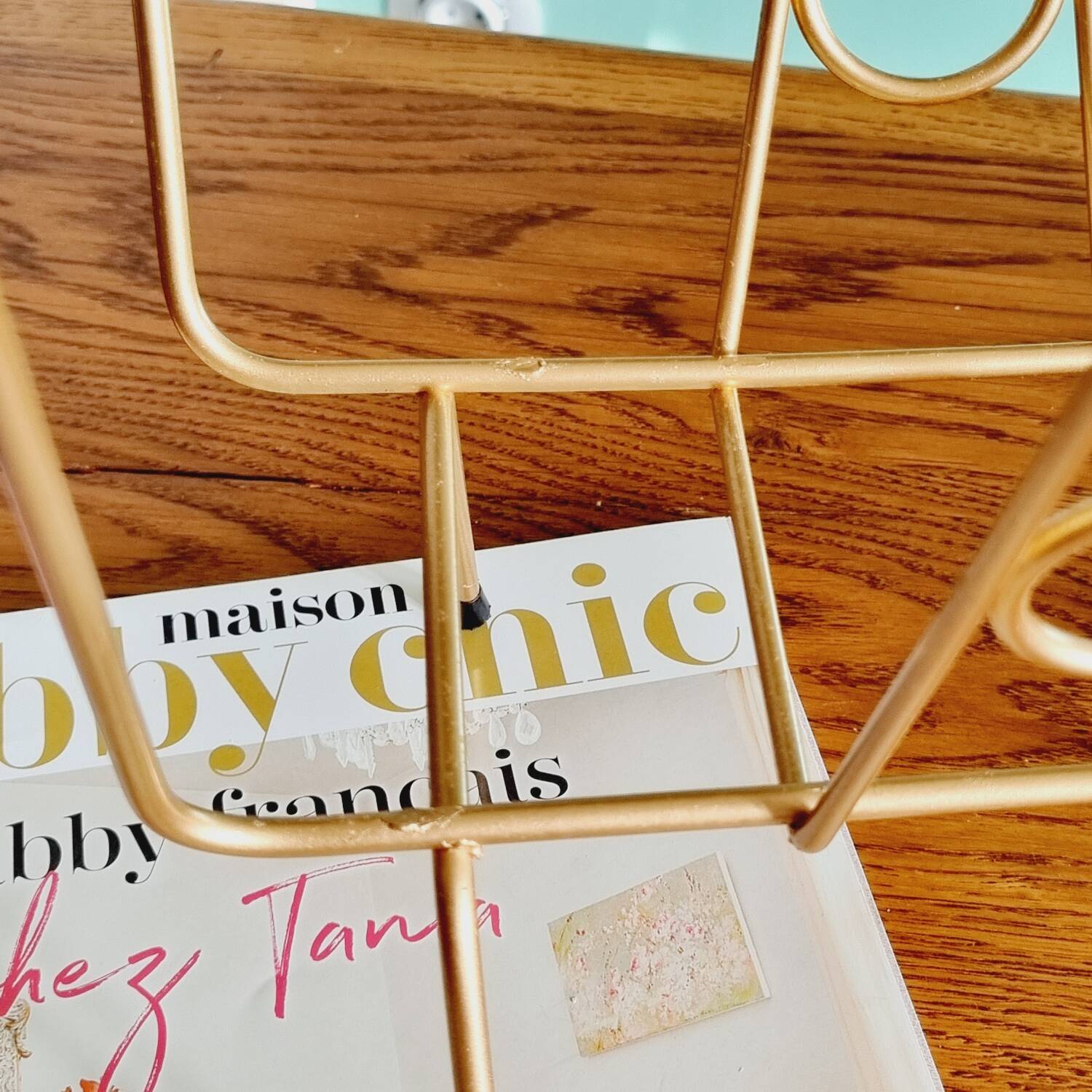 Golden metal magazine holder