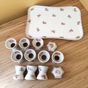 10 devil's egg cups and 2 porcelain salt cellars by Haviland and Le Tanneur 1920