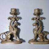 Pair of bronze hand candlesticks decorated with chimeras 19th century