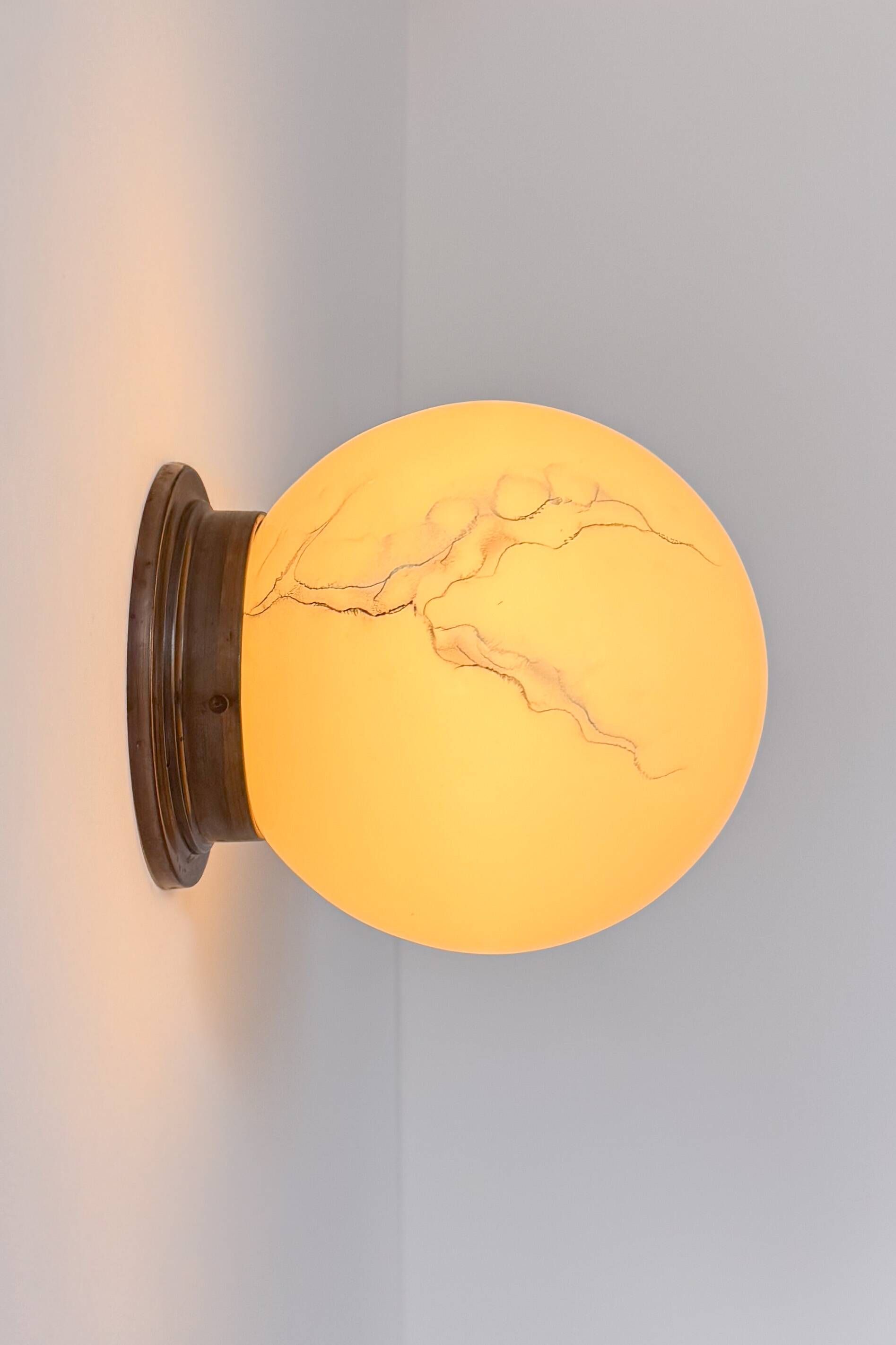 Pair of vintage wall lights, brass and "marbled" opaline, France, 1940.
