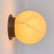 Pair of vintage wall lights, brass and "marbled" opaline, France, 1940.