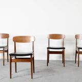 Ensemble de 4 chaises en teck et similicuir du milieu du siècle.