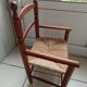 Fauteuil enfant en bois et assise paillèe.