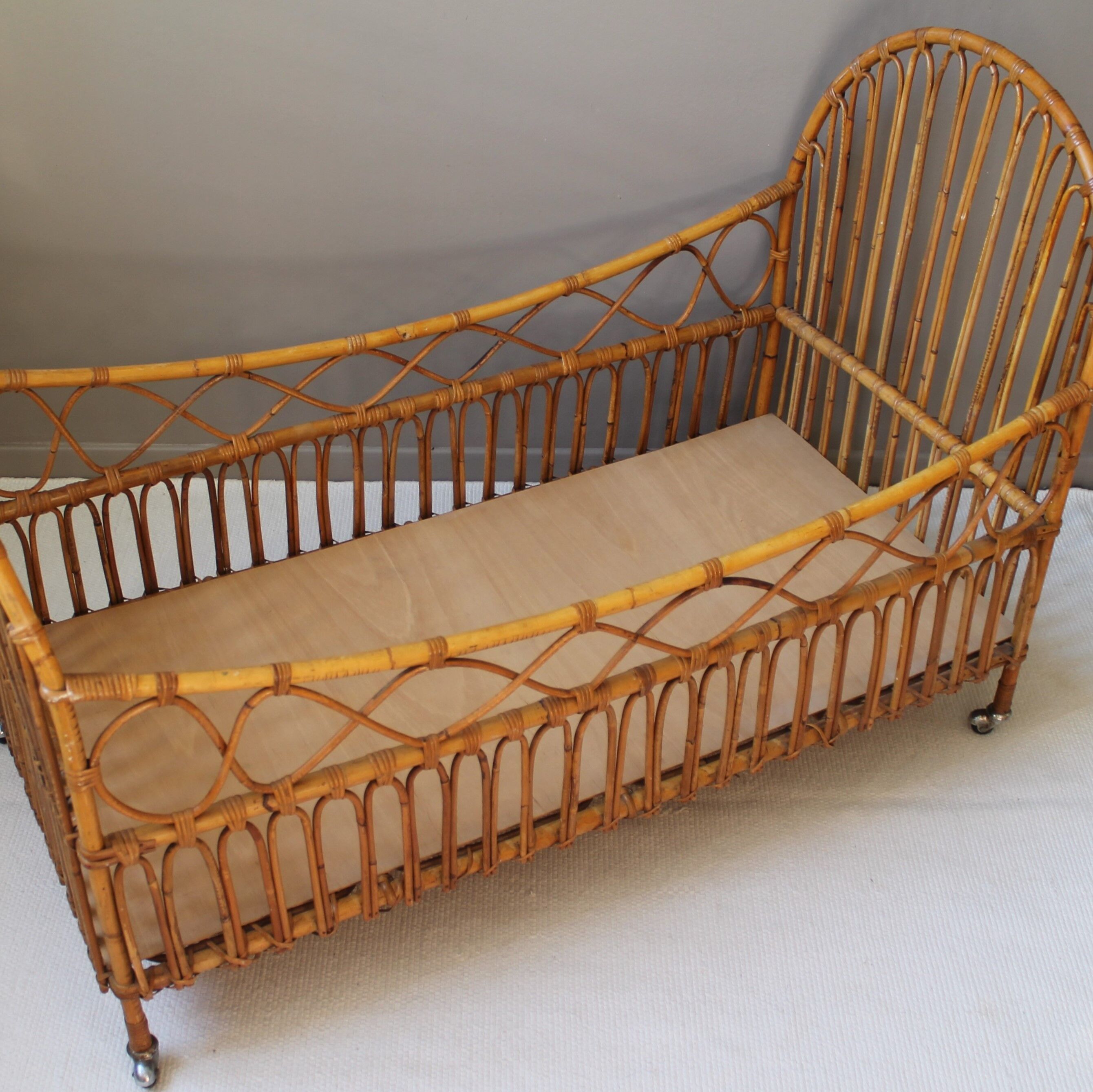 Vintage rattan cradle