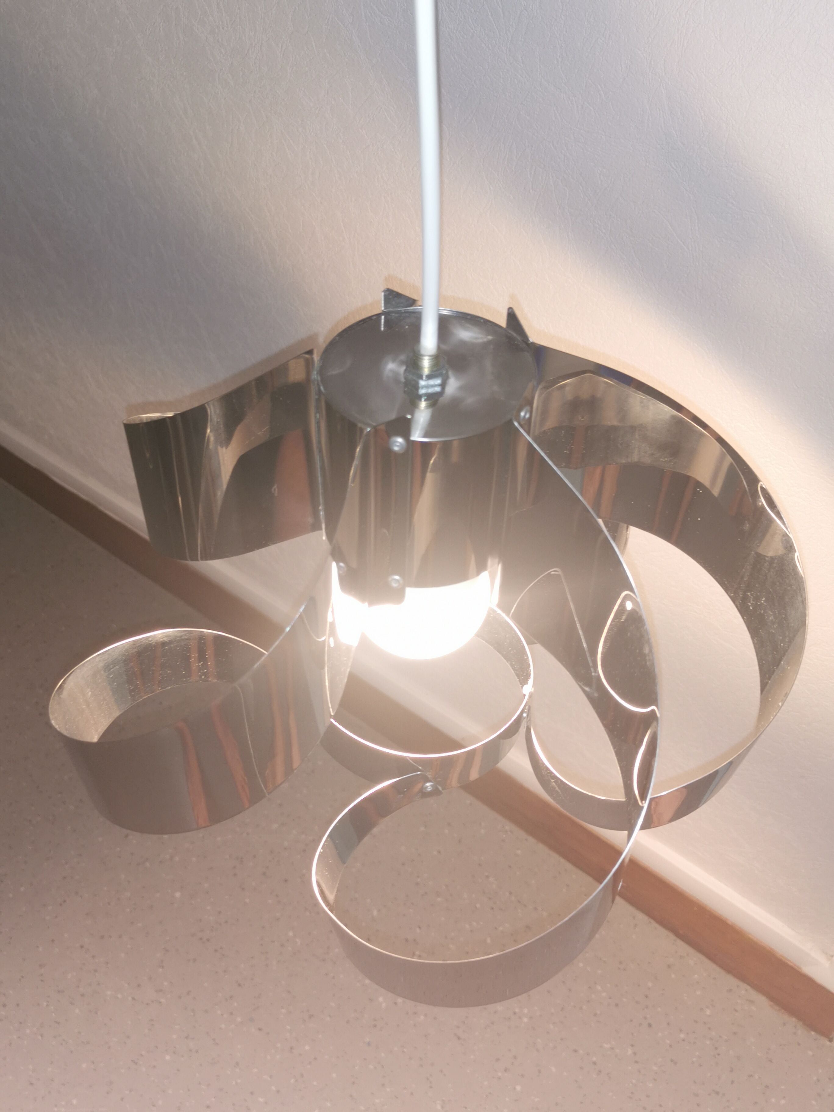 Curved stainless steel hanging lamp, Space Age, 1970