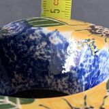 Moroccan ashtray decorated with blue/yellow/green flowers