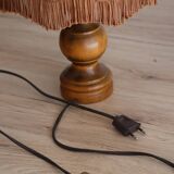 Table lamp in turned wood and umbrella-style leather lampshade