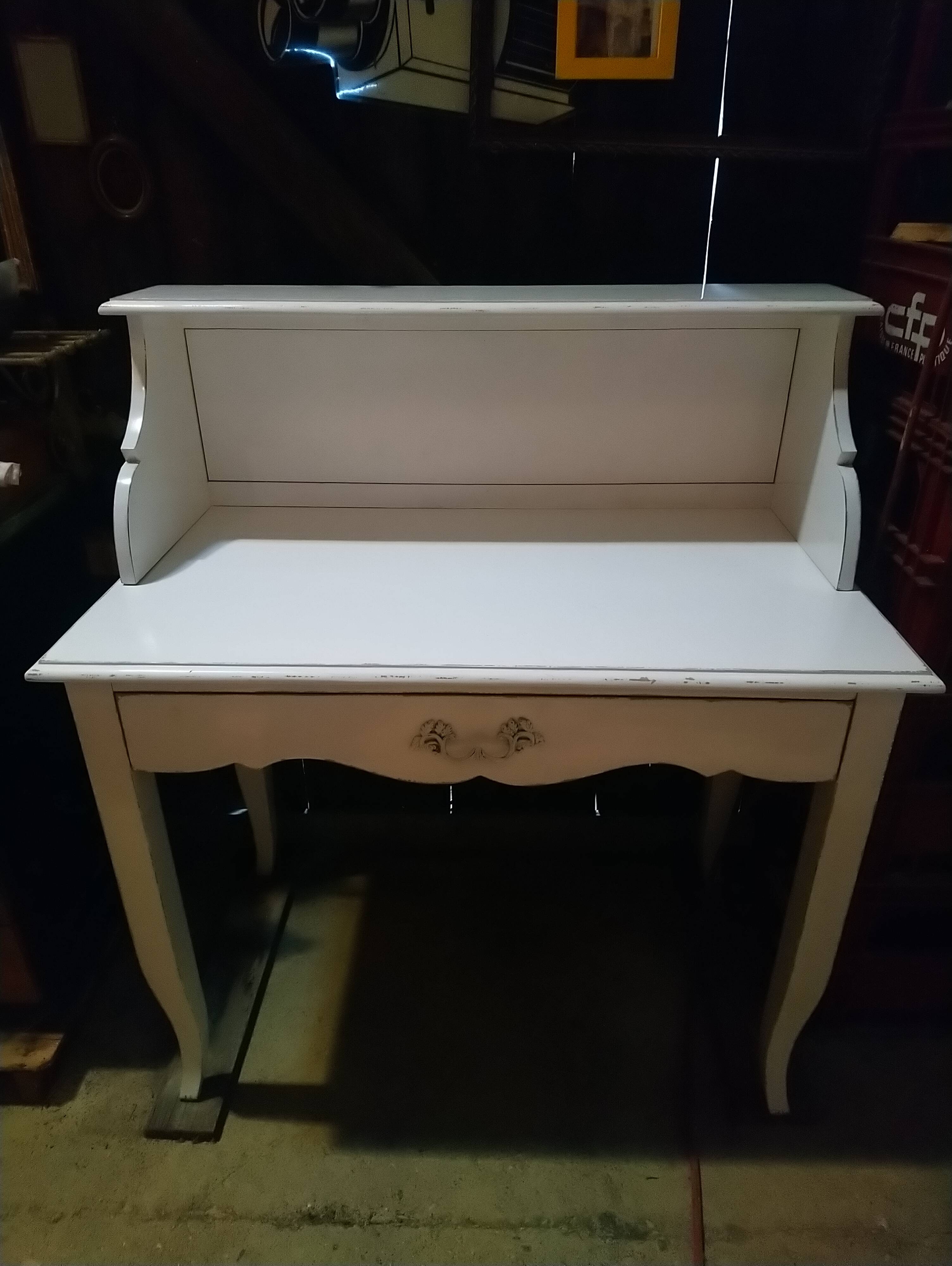 White lacquered desk.