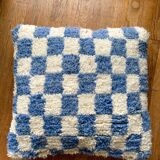 Blue and white checkered wool cushion
