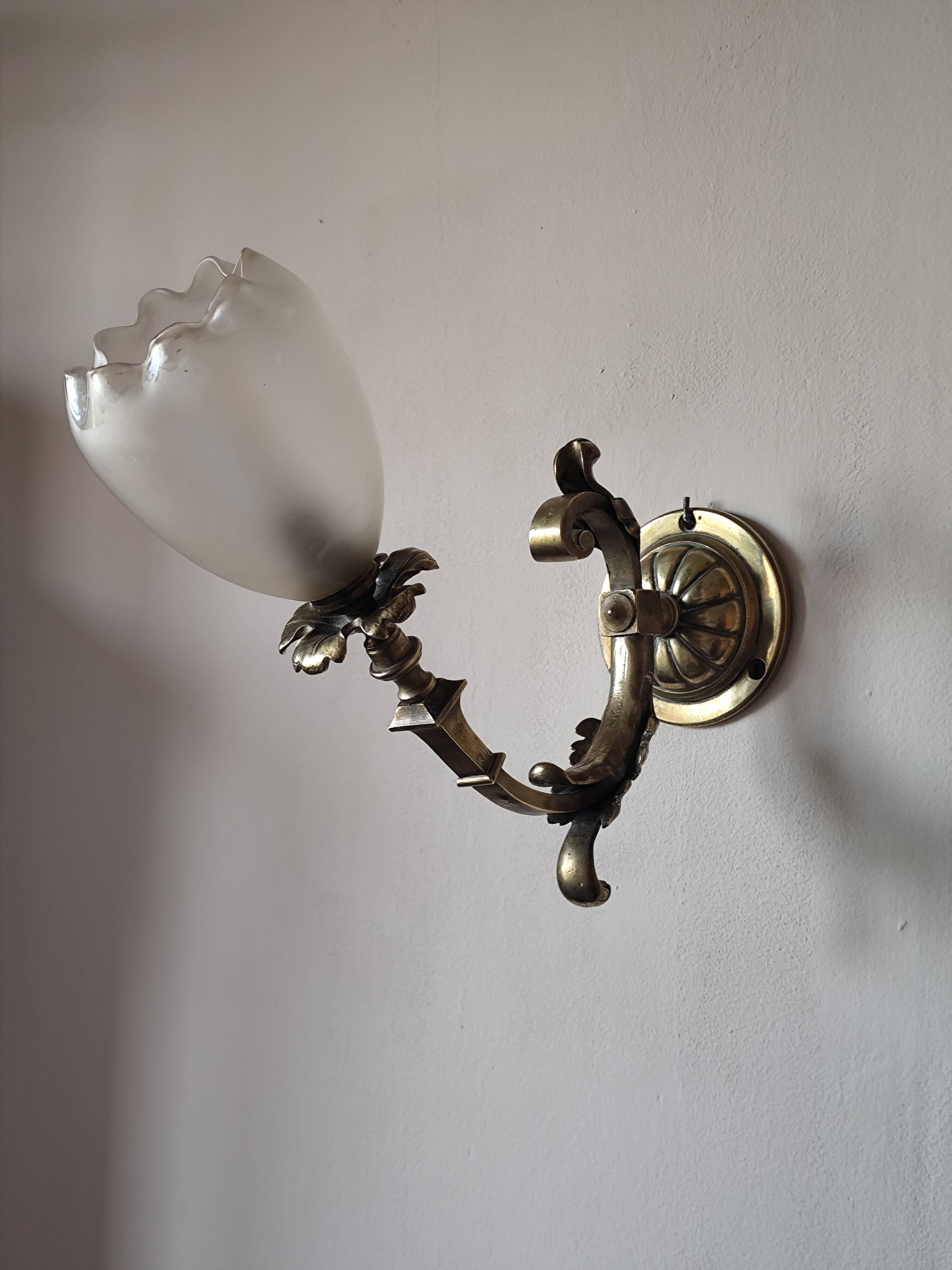 Bronze wall light with opaque glass tulip 1900
