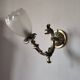Bronze wall light with opaque glass tulip 1900