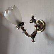 Bronze wall light with opaque glass tulip 1900