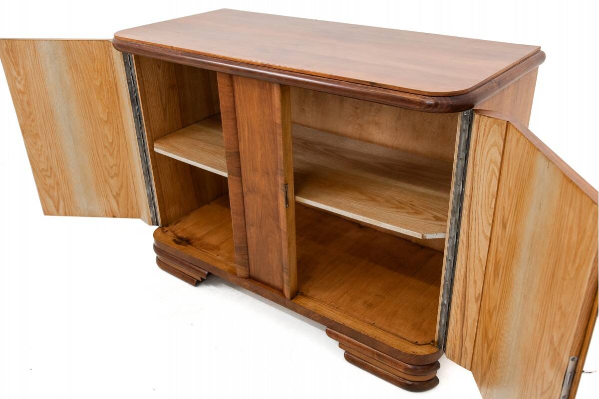 Art Deco style walnut chest of drawers, Poland, 1950s.