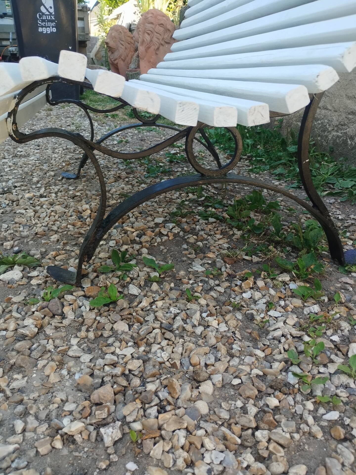 Antique garden bench with cast iron legs