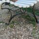 Antique garden bench with cast iron legs