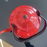 Red enamelled sheet metal kettle