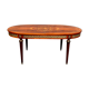 Louis XVI style oval dining table with rosewood marquetry extension mounted in bronze