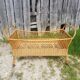 Former cradle bed baby rotin curved on vintage 60s roulettes