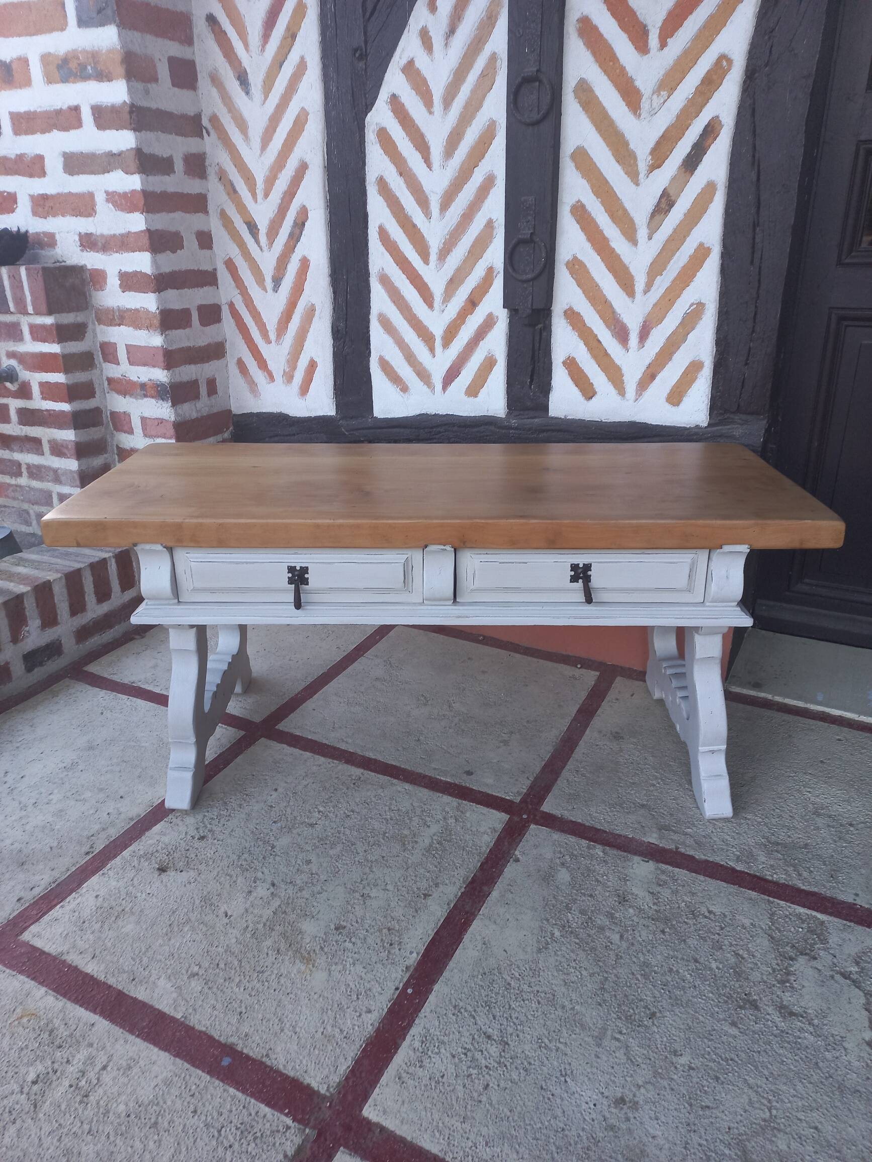 Patinated linen coffee table with raw top