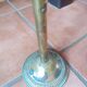 Ashtray on foot. Bronze and brass, with fleur-de-lis decoration.