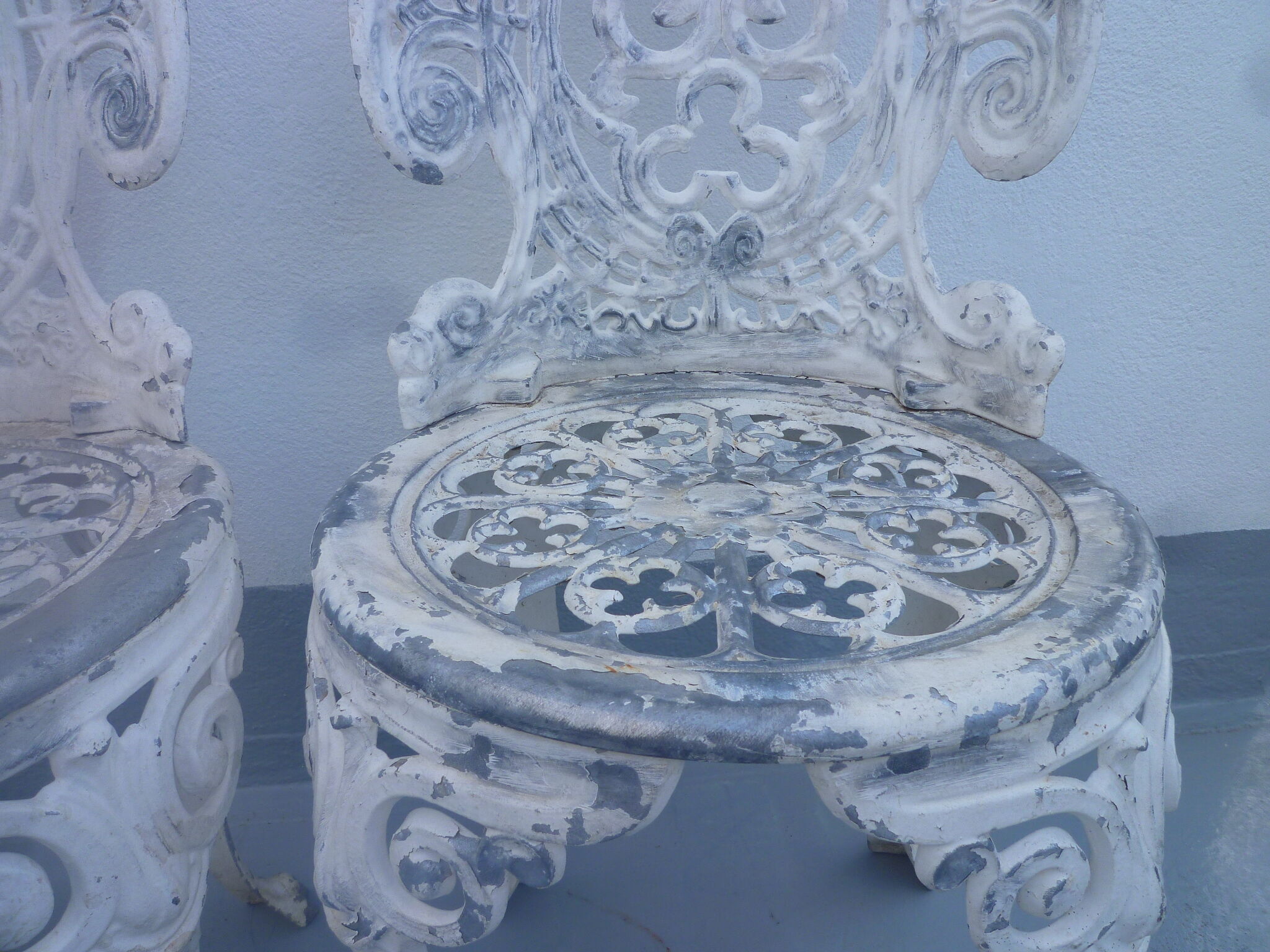 2 cast aluminum chairs