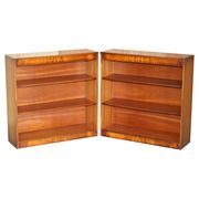 Pair of open dwarf bookshelves in mahogany by Shaws of London.