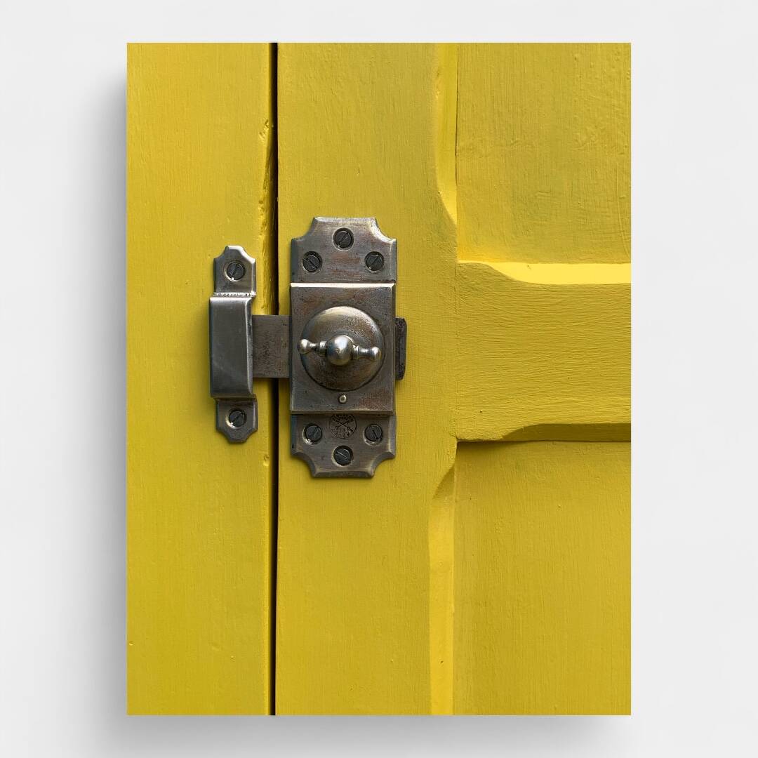Antique powder yellow Parisian bonnetière wardrobe.