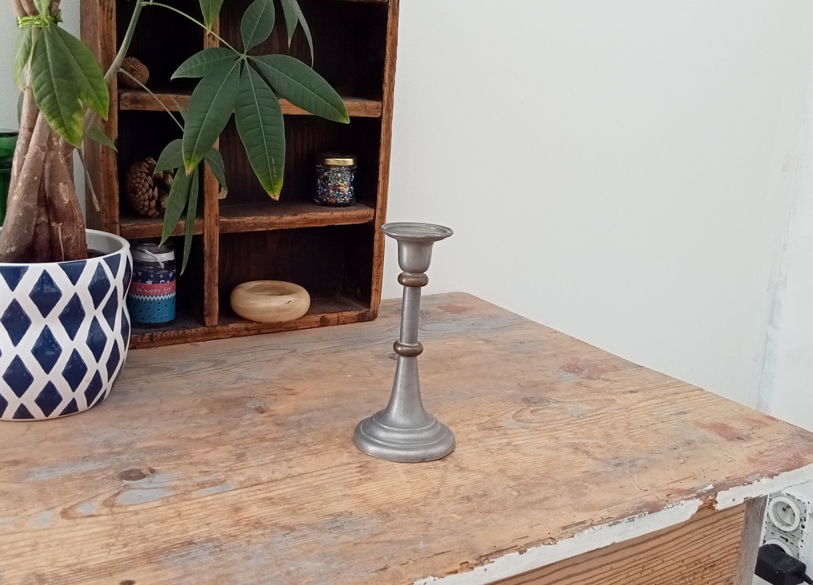 Antique candle holder in pewter and brass