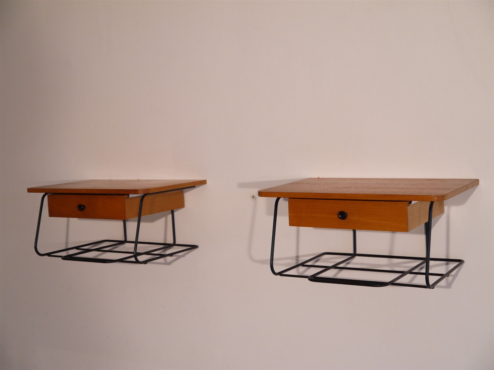 Scandinavian vintage hanging bedside pair in teak and metal