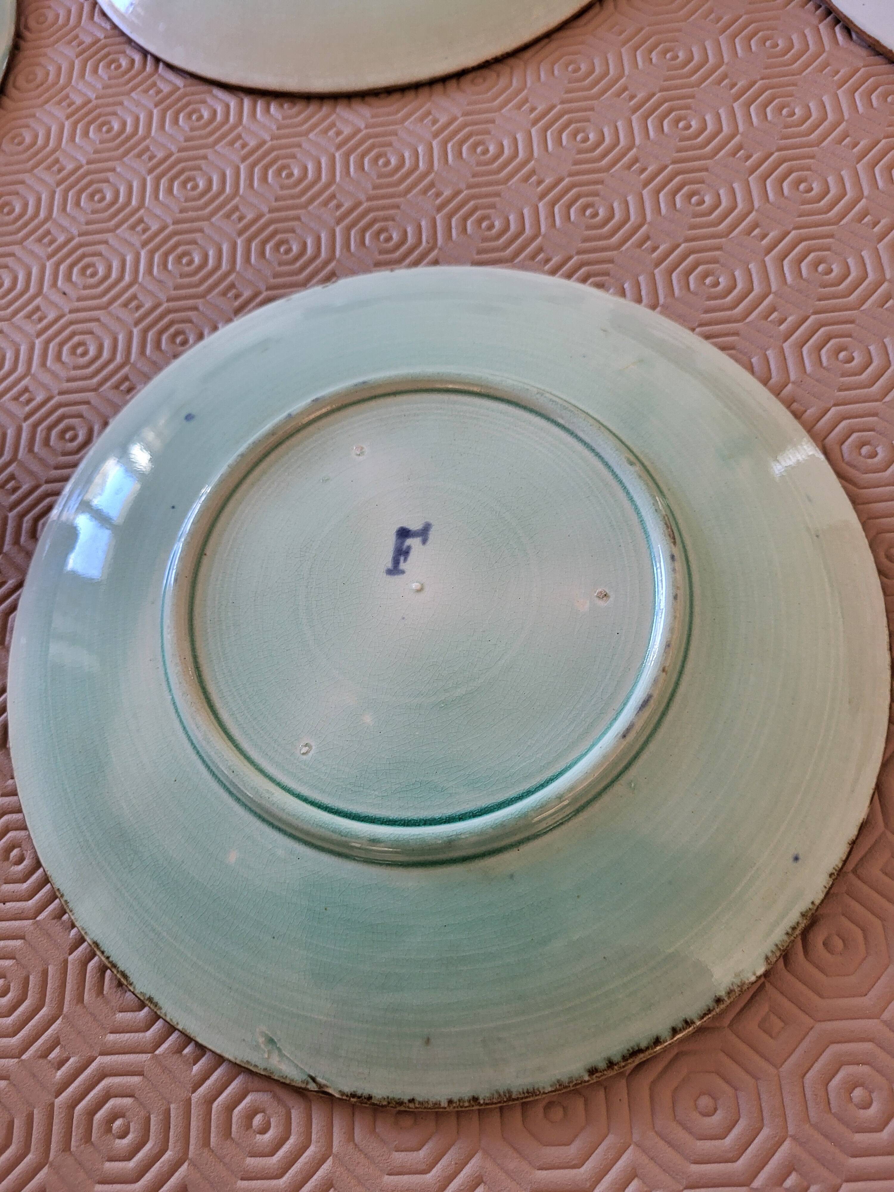 Set of earthenware plates from Wasmüel.